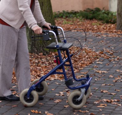 elderly walking with walker